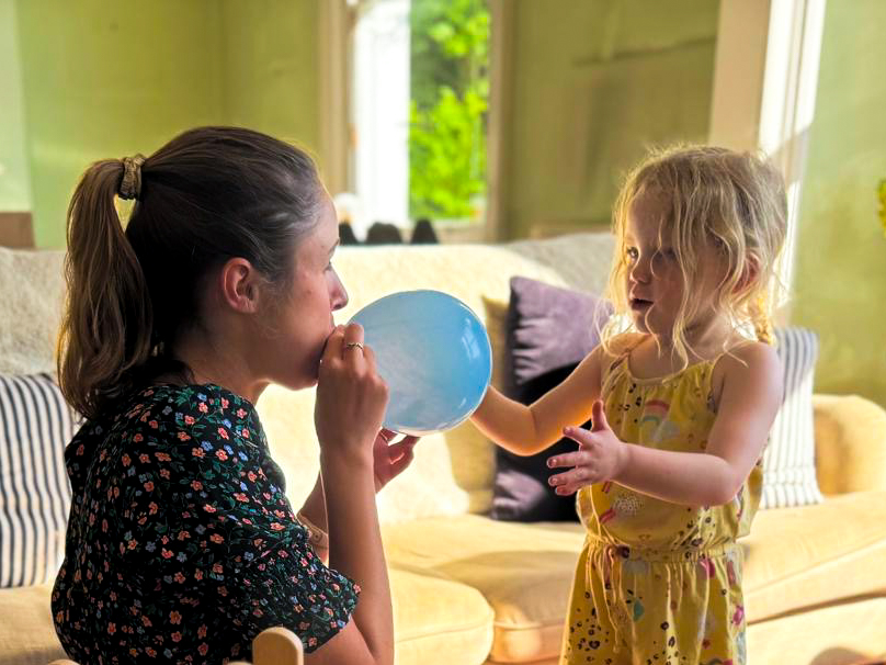 Alice Blackburn working with a child.